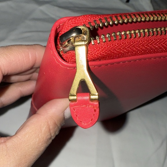 Preloved Yves Saint Laurent red leather long wallet pristine condition zipper. - Picture 4 of 6